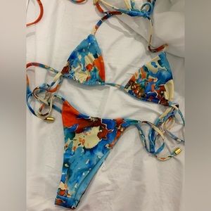 selling swim’ing multicolor bikini! used once but now is too small on me :(